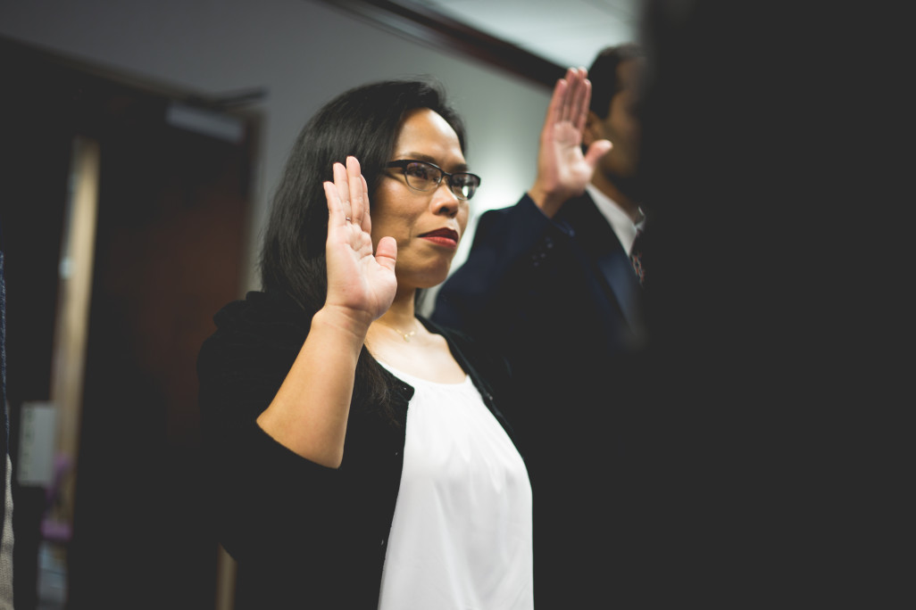 filipina woman taking an oath in court